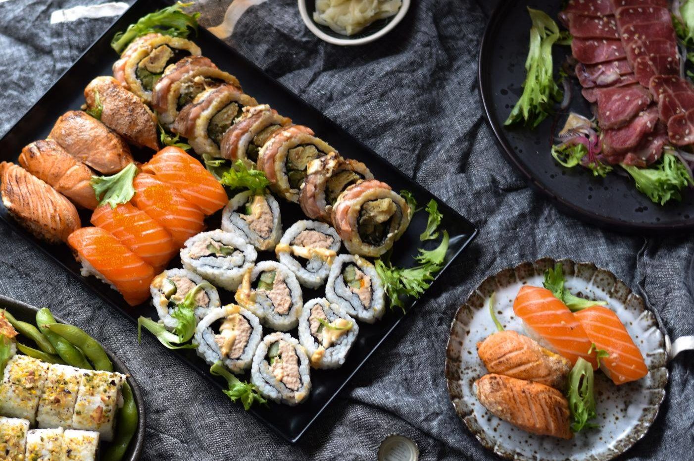 Sushi Sushi franchise table with plates of sushi